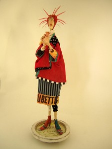 Betty and Geranium . . . mixed media figurative sculpture